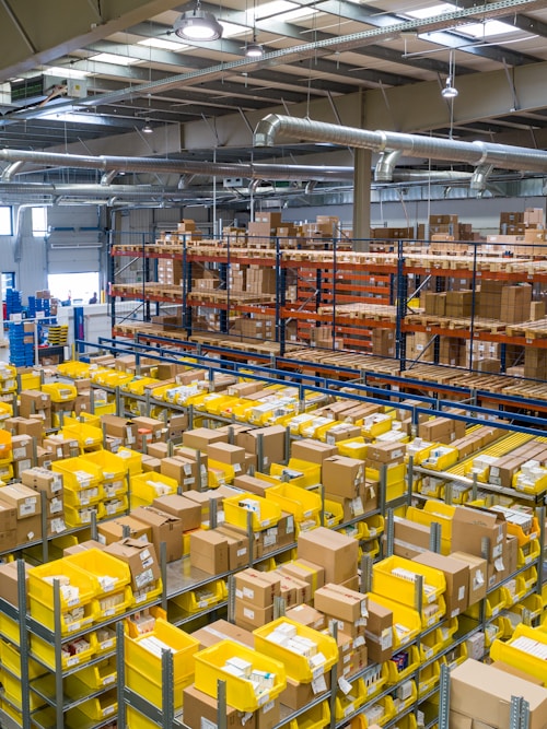 Packed warehouse full of boxes, overstock detection